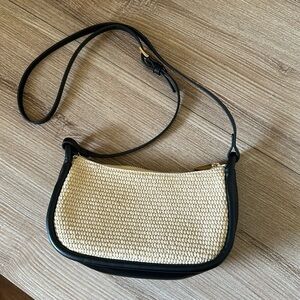 Black faux leather and rattan cross body bag